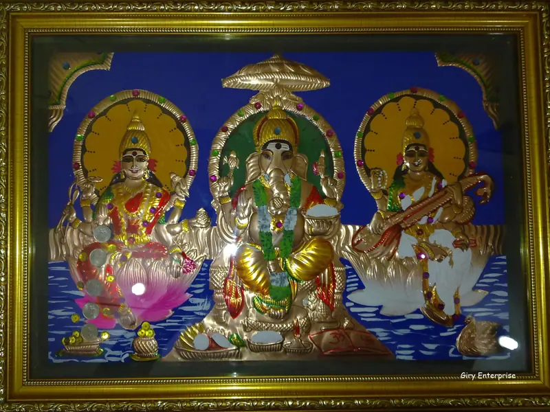 Lakshmi Vinayagar Saraswathi in hand-tooled copper, painted and framed, full frontal view
