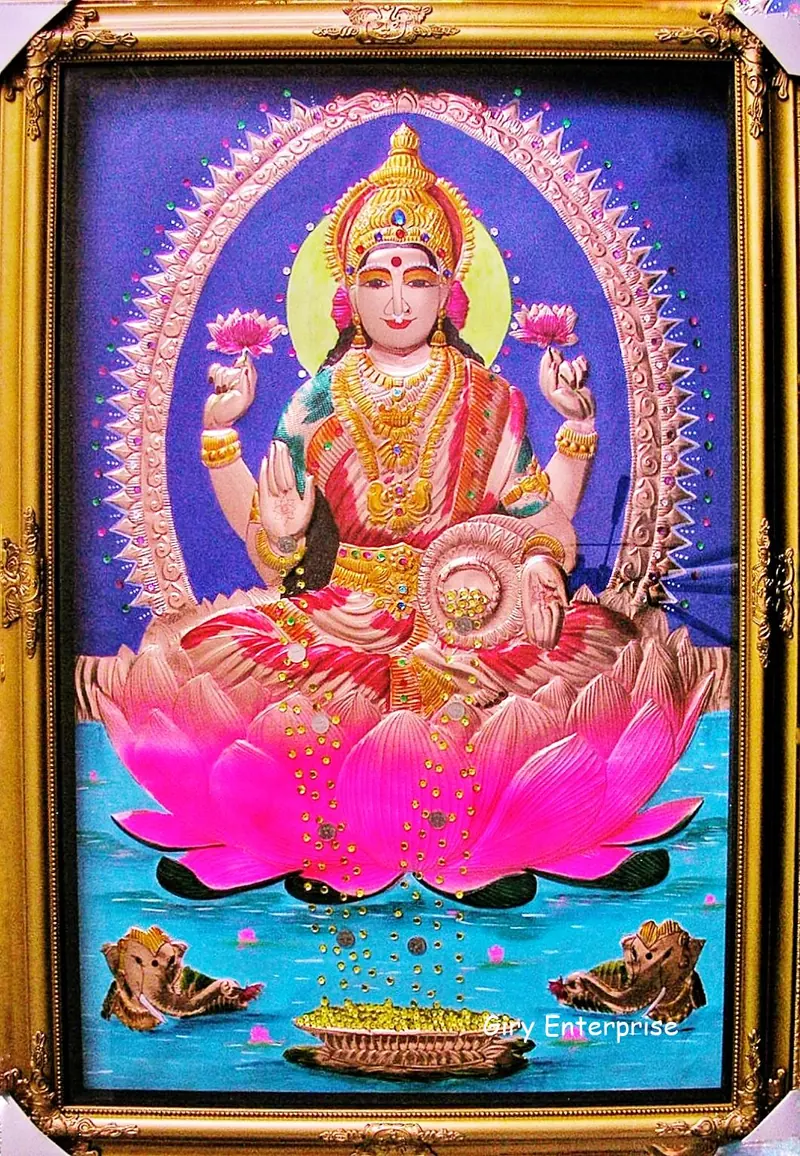 Mahalakshmi in hand-tooled copper, painted and framed, full frontal view