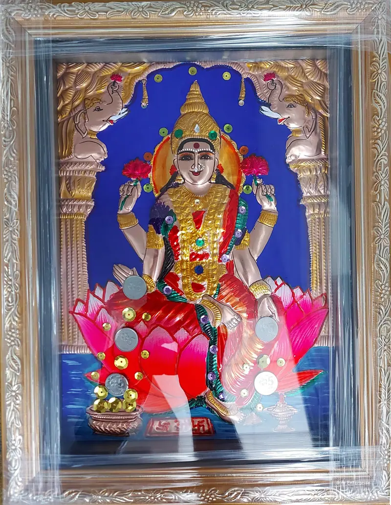 Mahalakshmi in hand-tooled copper, painted and framed, full frontal view