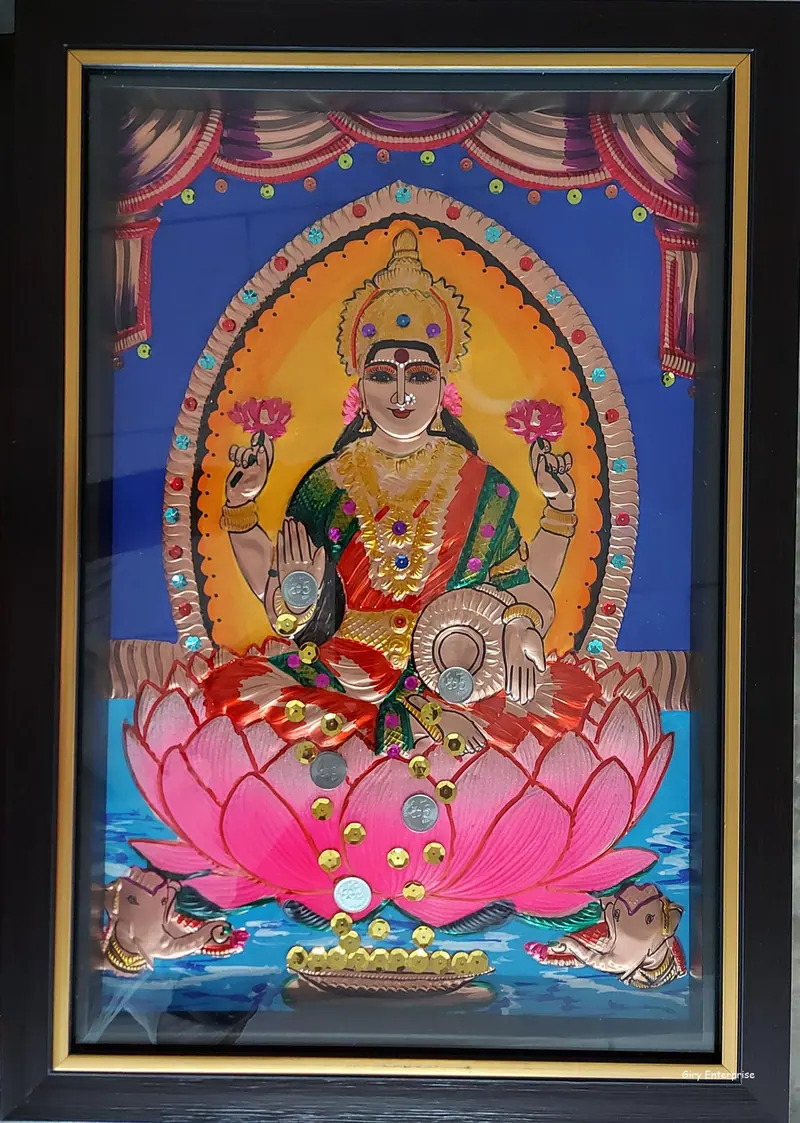 Mahalakshmi in hand-tooled copper, painted and framed, full frontal view