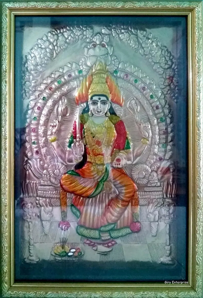 Mariamman in hand-tooled copper, painted and framed, full frontal view