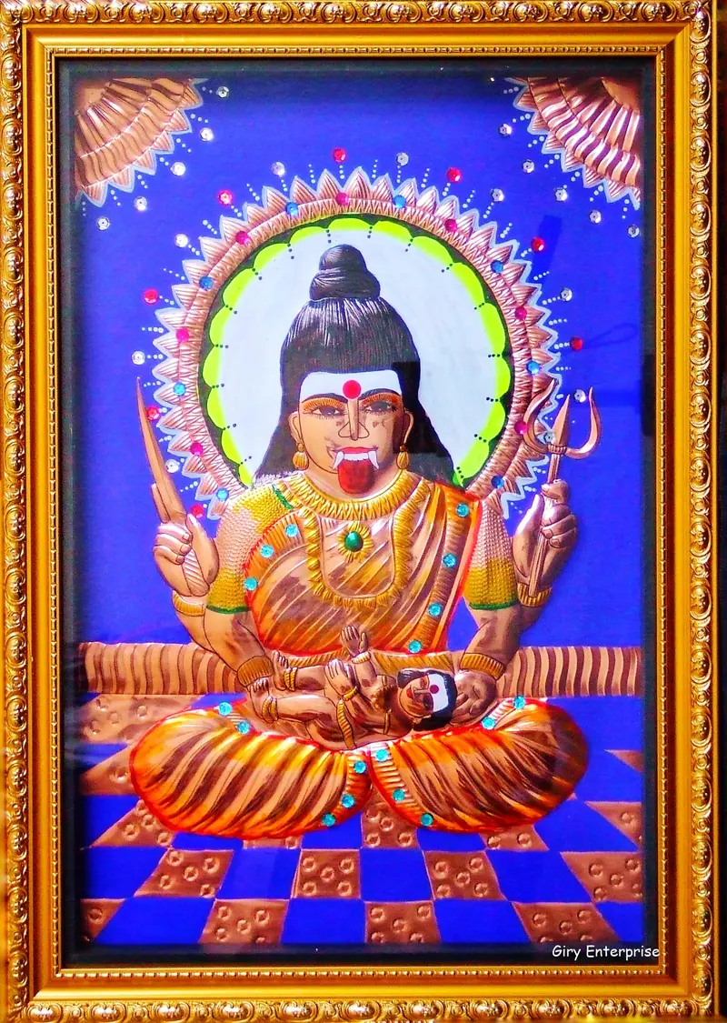 Periyachi Amman in hand-tooled copper, painted and framed, full frontal view