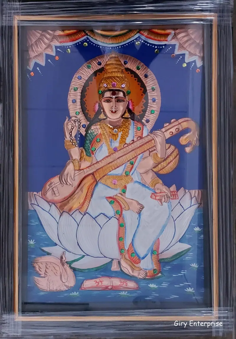 Saraswathi in hand-tooled copper, painted and framed, full frontal view