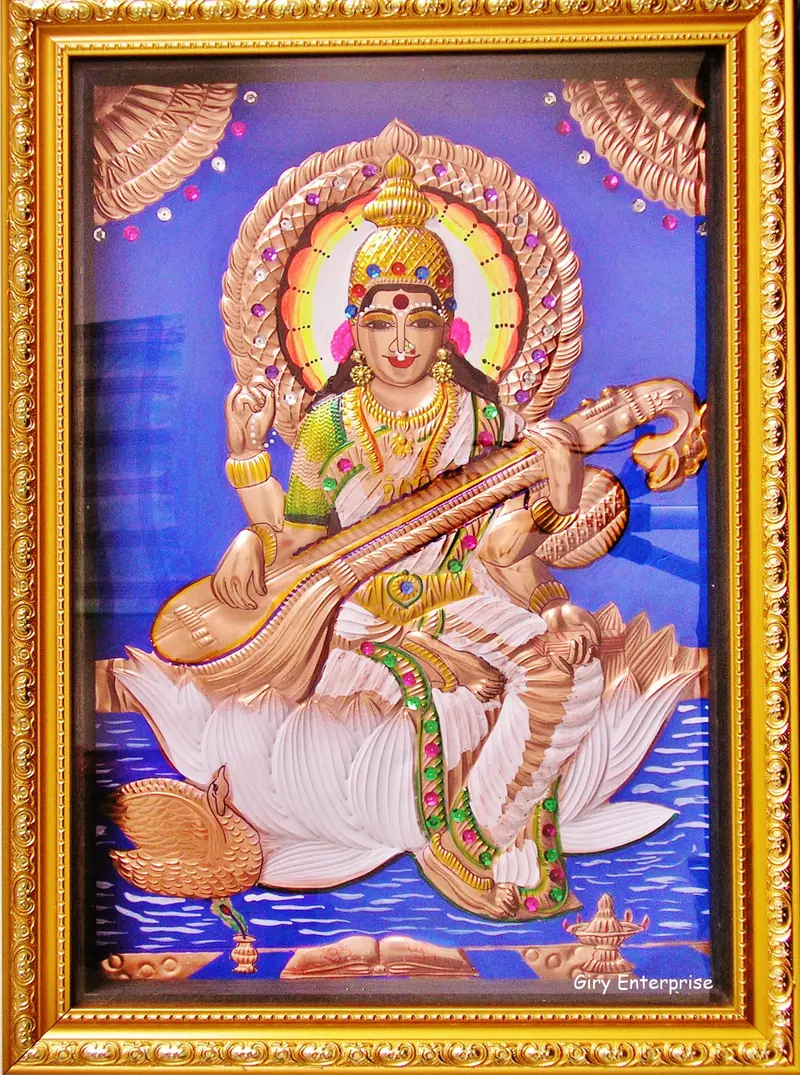 Saraswathi in hand-tooled copper, painted and framed, full frontal view