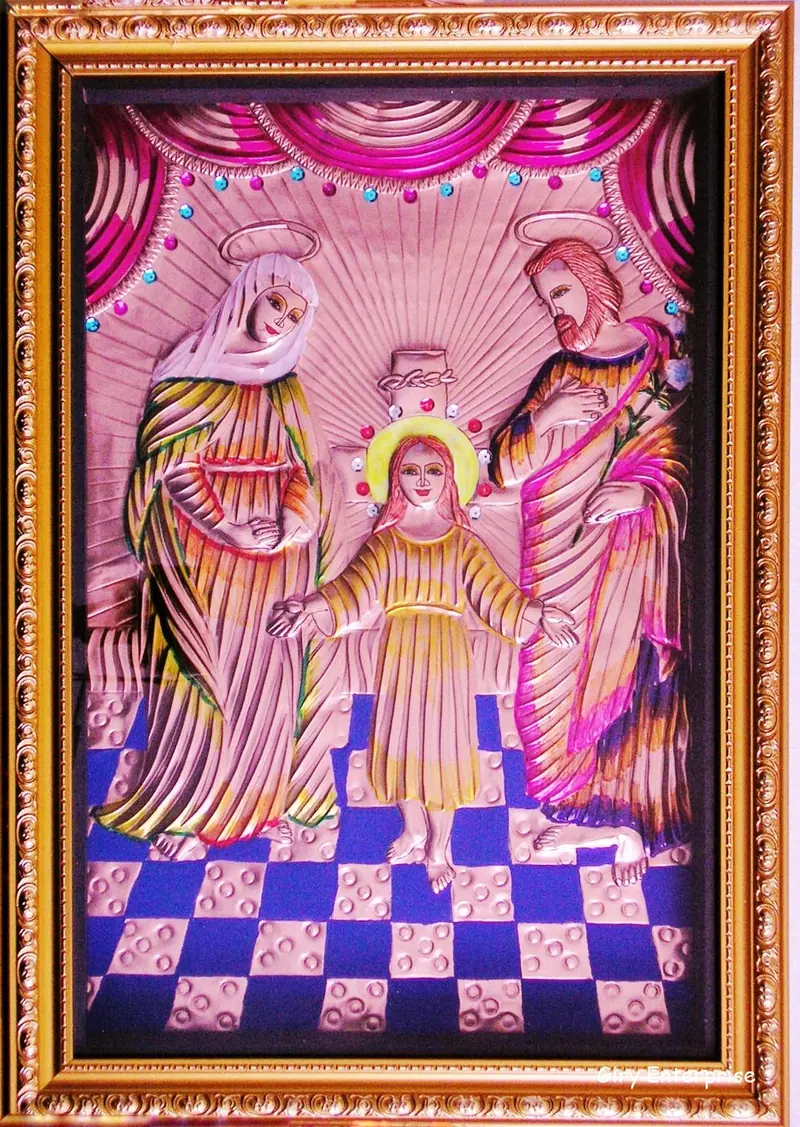 The Holy Family (Thirukudumbam) in hand-tooled copper, painted and framed, full frontal view